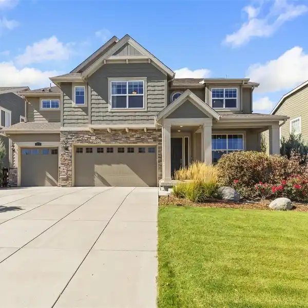 COLORADO RETREAT WITH COVERED DECK AND LANDSCAPED YARD