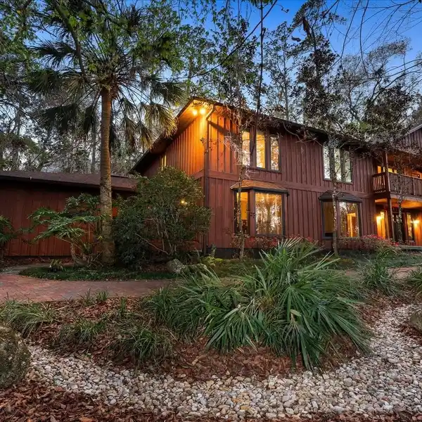 CUSTOM HOME ON OVER 2.5 ACRES IN SHANDS WOODS
