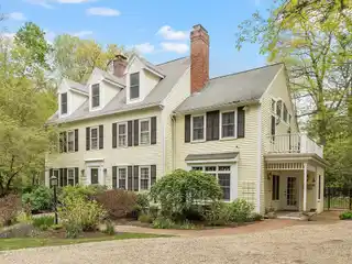Timeless Colonial Charm on Private Acre Lot
