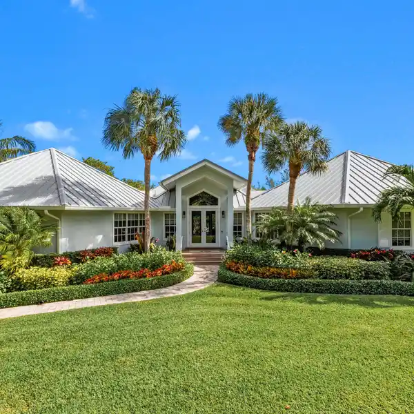 GORGEOUS TURNKEY HOME ON 1.5 LUSH ACRES
