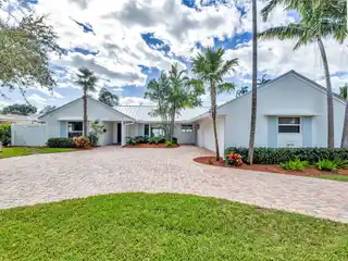 Pristine Pool Home in Highly Sought-after Coral Ridge Country Club