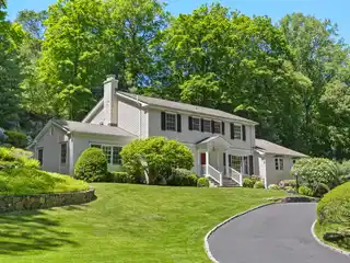 Elegant Colonial with Lush Yard