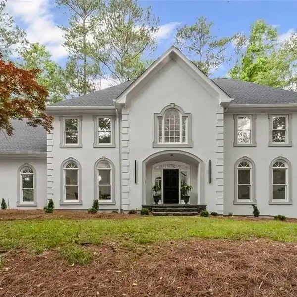 SUNLIT OAK-FLOORED HOME ON ONE ACRE