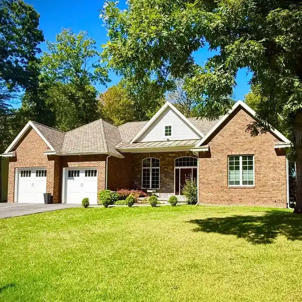 CUSTOM BRICK BEAUTY WITH BACKYARD VACATION OASIS