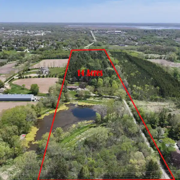REMODELED MUSKEGO ESTATE WITH PRIVATE POND
