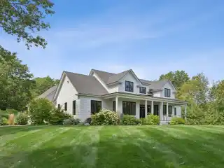 Exceptional Extended Cape Cod Style Home