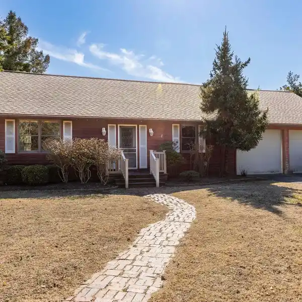 FOUR BEDROOM RANCH HOME IN A LUSH SETTING