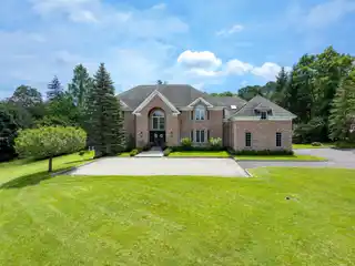 Stately Brick Colonial on Nearly Three Private Acres