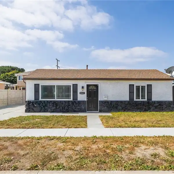 UPDATED HOME WITH SPACIOUS BACKYARD OASIS