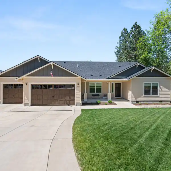 IMMACULATE HOME WITH BEAUTIFUL ROGUE RIVER FRONTAGE