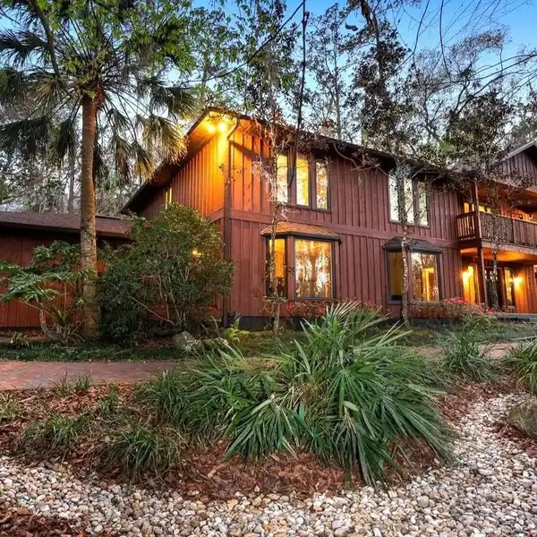 CUSTOM HOME ON OVER 2.5 ACRES IN SHANDS WOODS