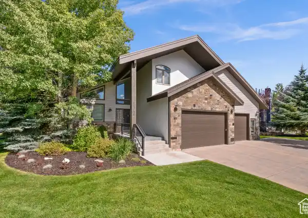 LIGHT-FILLED HOME IN A SOUGHT-AFTER NEIGHBORHOOD