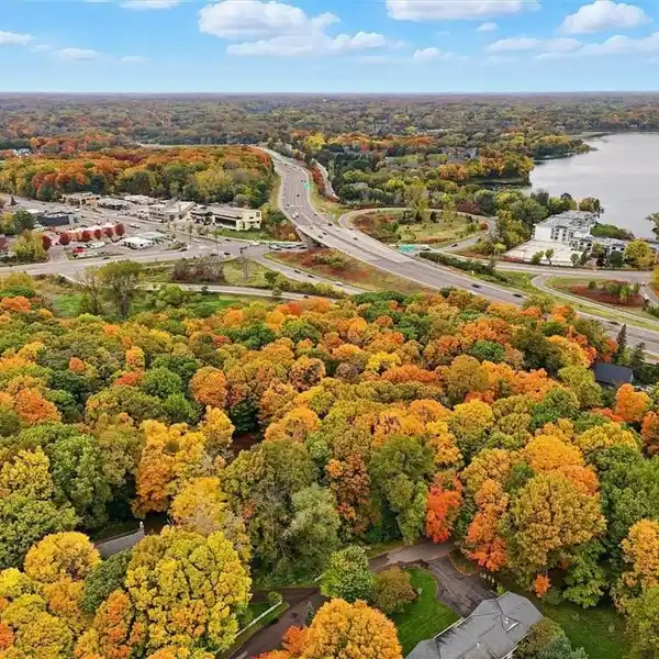 GORGEOUS HOME ON AN EXQUISITE WOODED ACRE