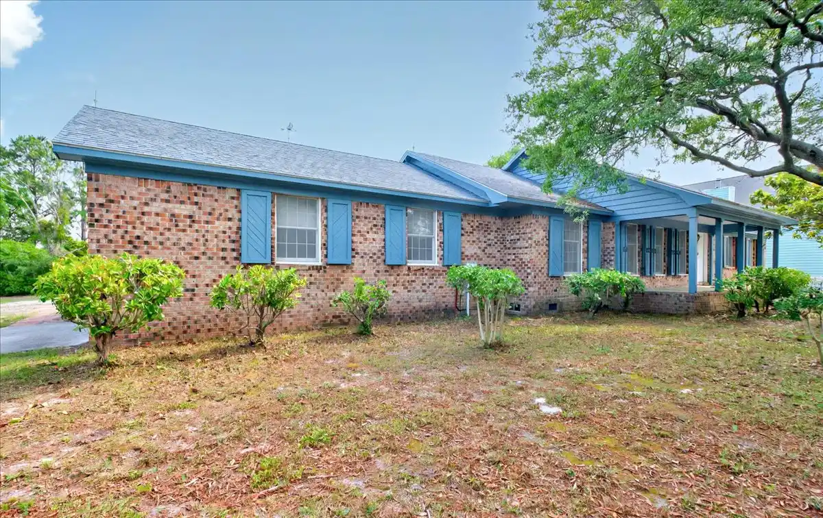 A Rare Intracoastal Offering — Iconic Oak Island Estate on Two Expansive Waterfront Lots