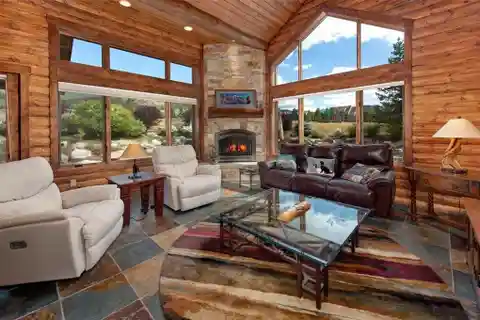 Immaculate Home with Rustic Log Accents