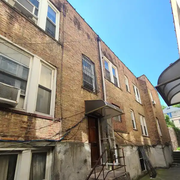 CROWN HEIGHTS TWO-FAMILY TOWNHOME WITH MAJOR POTENTIAL