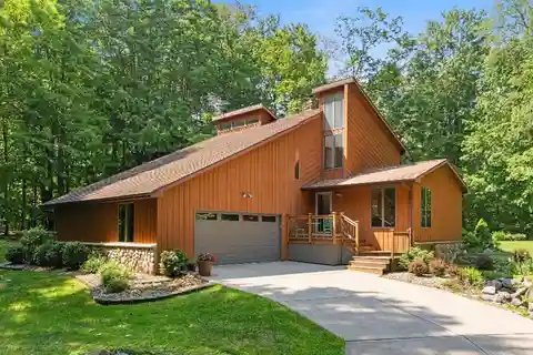 Meticulously Cared for Home on a Wooded Retreat