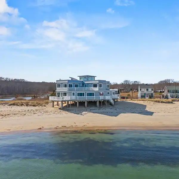 COVETED HOME IN DESIRABLE POINT O' WOODS