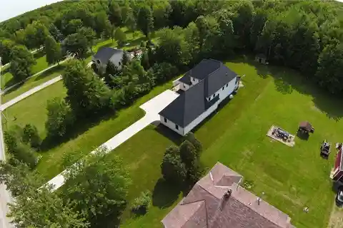 Bold New-Build with Acre of Wooded Privacy