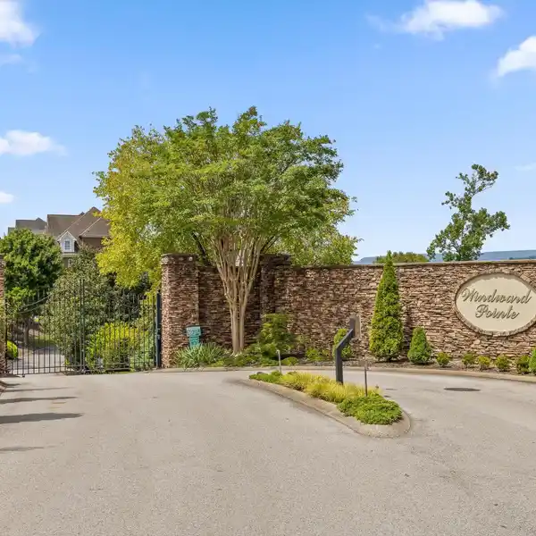 MULTI-LEVEL LAKEFRONT RETREAT WITH GUEST SUITE