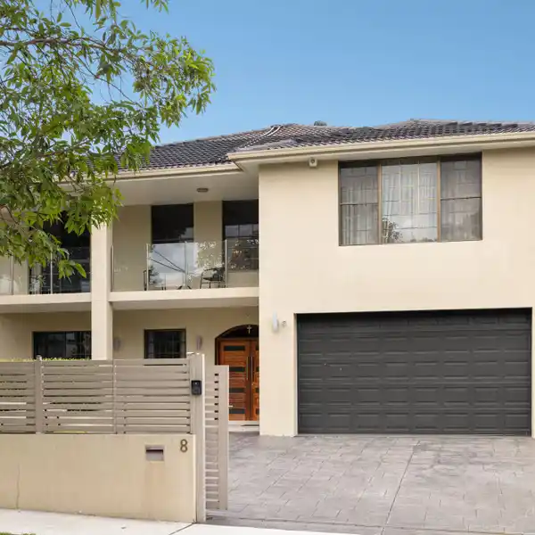 METICULOUSLY MAINTAINED FULL BRICK RESIDENCE