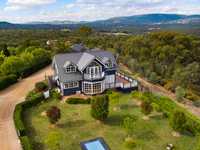 CHARACTER-FILLED COUNTRY HOME WITH VAST DISTRICT VIEWS
