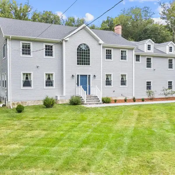 EXCEPTIONAL COLONIAL HOME ON OVER AN ACRE