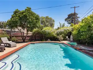 Stylish Single-Family Home with Backyard Oasis