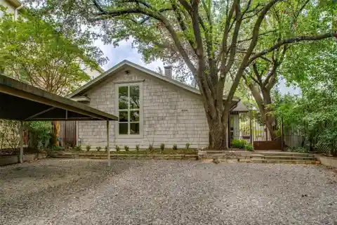 Rare Oak Lawn Gem with Lavish Finishes