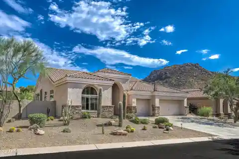 Beautifully Maintained Home in the Desirable Troon Neighborhood