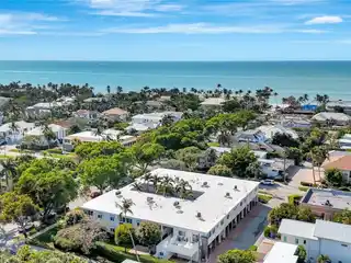 Artfully Redesigned Condominium Steps to the Gulf