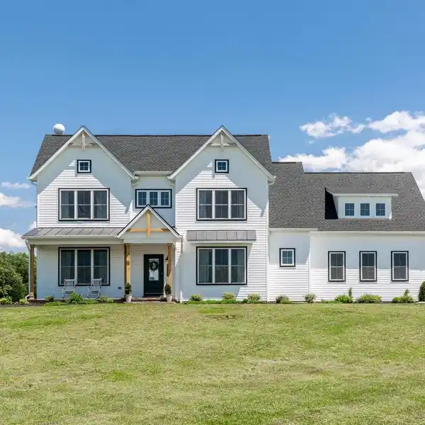 CONTEMPORARY COLONIAL ON THREE SCENIC ACRES
