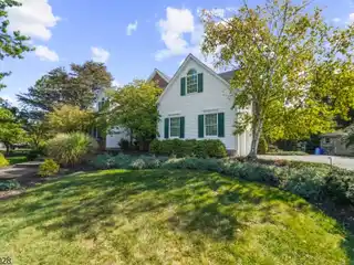 Upgraded Cul-De-Sac Colonial with Poolside Charm