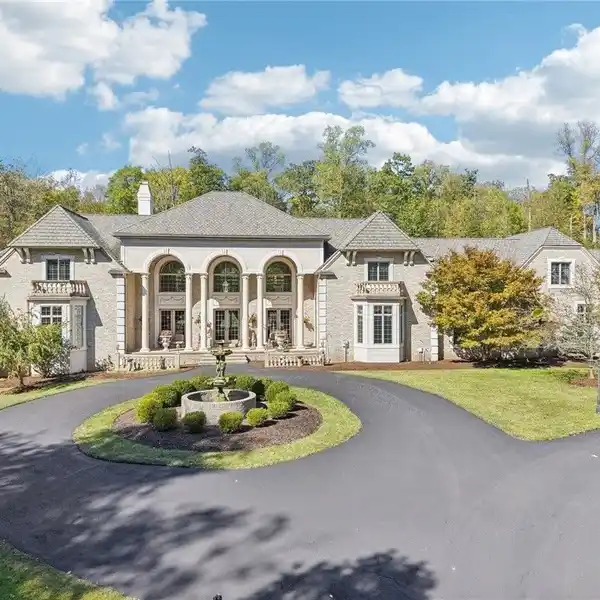 GATED BRICK VILLA WITH LAVISH GARDEN COURTYARD