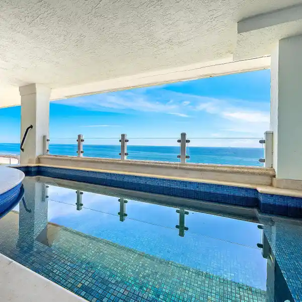 PRIVATE PENTHOUSE OASIS WITH SWEEPING OCEAN VIEWS