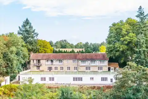 Expansive Stone Residence in a Lush Setting