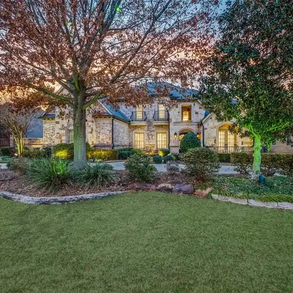 CUSTOM HOME BY AWARD WINNING BUILDER ON 1/2 ACRE CREEK LOT IN GATED NEIGHBORHOOD