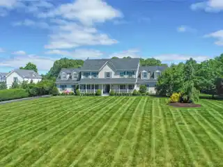 Meticulously Maintained Front Porch Colonial