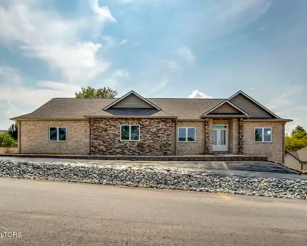 BEAUTIFULLY DESIGNED ALL-BRICK AND STONE NEW CONSTRUCTION