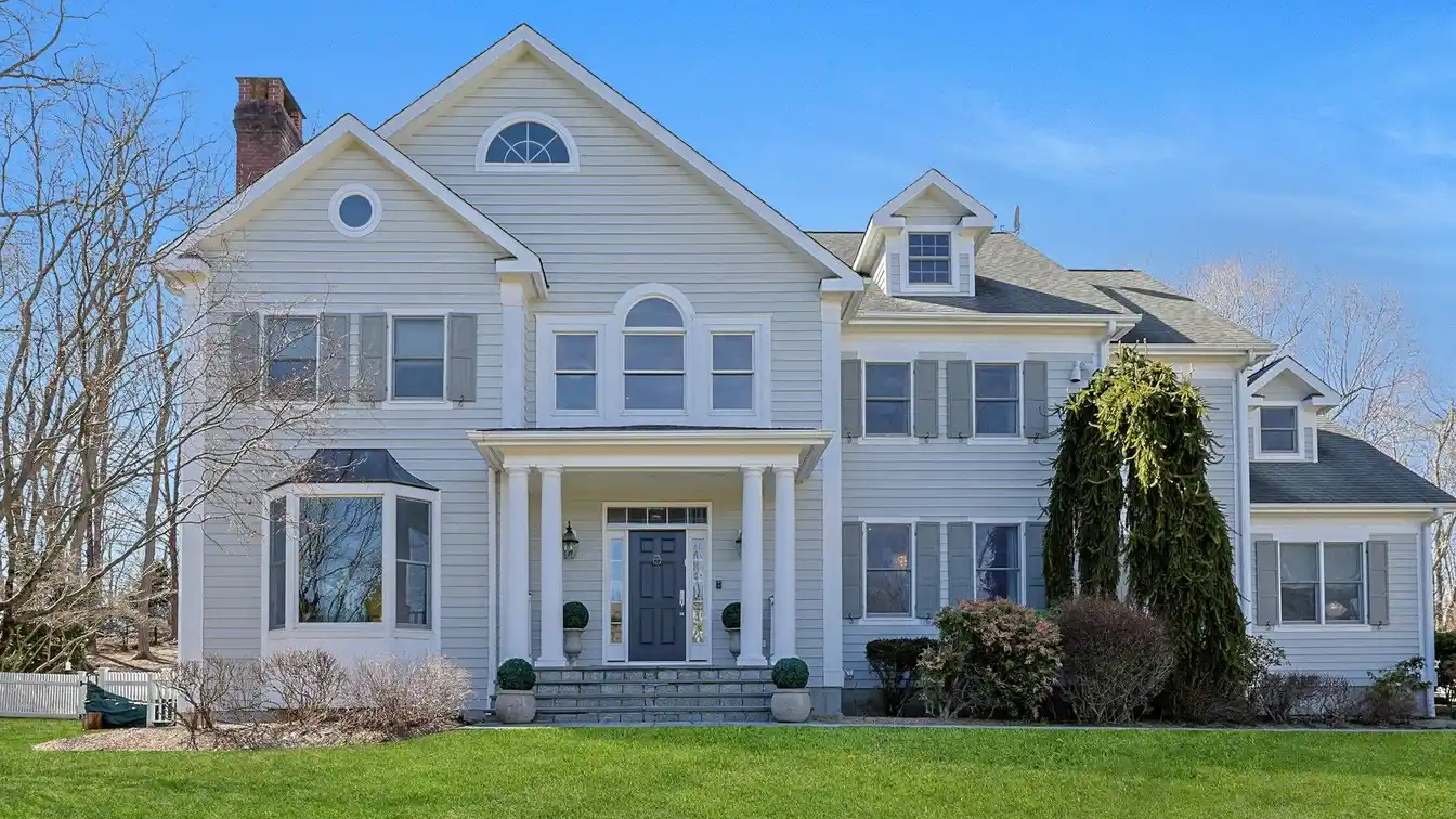 Amazing Center Hall Colonial on over Two Acres