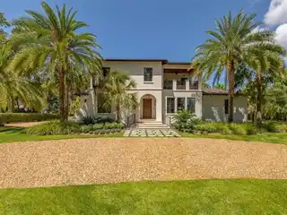 Mizner Inspired Home in Gated Hawkins Island