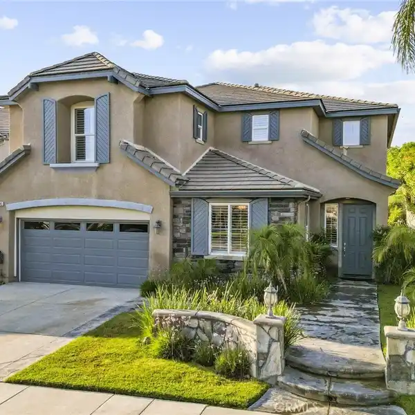 BEAUTIFULLY MAINTAINED SPACIOUS HOME IN AN IDEAL LOCATION