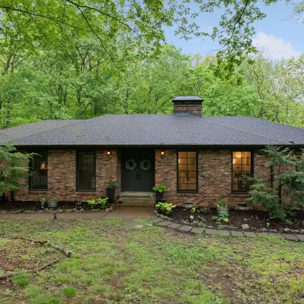 RECENTLY UPGRADED HOME IN THE TREES