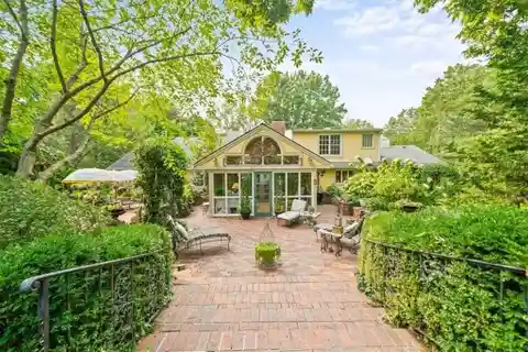 Elegant Estate with Lush Gardens and Timeless Design