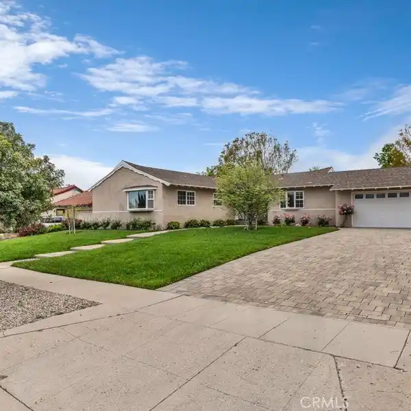 MOVE-IN READY BEAUTY ON A TREE-LINED STREET