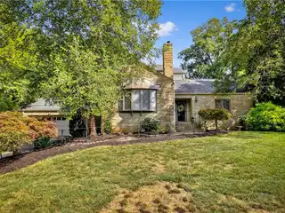 Elegant Stone Residence with Parkside Serenity