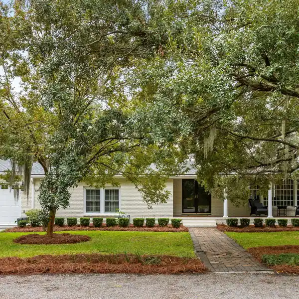 SOPHISTICATED LAKEFRONT LIVING WITH SUNLIT INTERIORS & SCENIC VIEWS