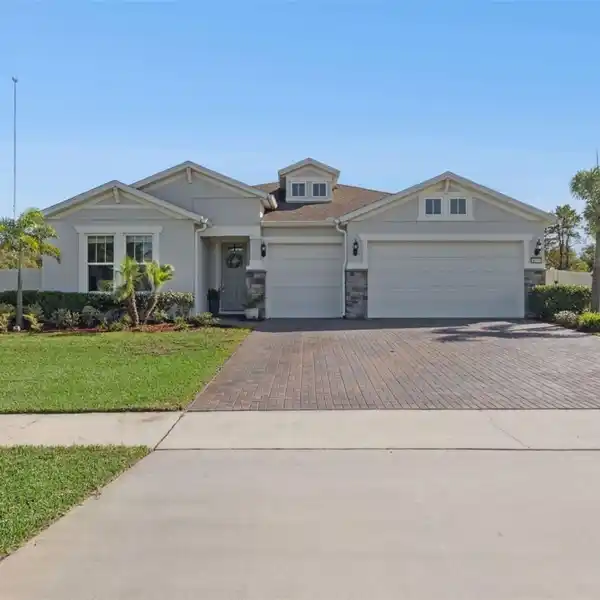LUXURY POOL HOME WITH EXPANSIVE HALF-ACRE PRIVACY
