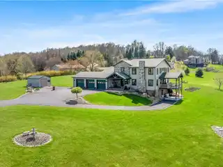 One-of-a-kind Custom Farmhouse on 11.5 Acres