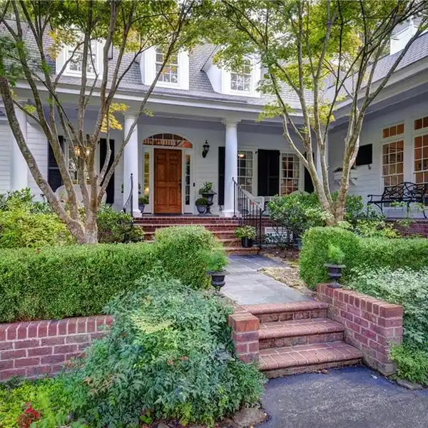 STORYBOOK COTTAGE ELEGANCE WITH LUSH GARDEN VIEWS